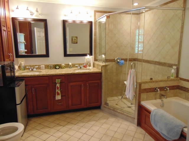 668 Mount Zion Rd NW, Georgetown, TN 37336 - bathroom featuring tile patterned flooring, a stall shower, a garden tub, and double vanity