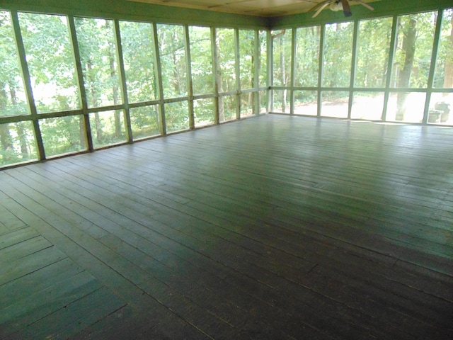668 Mount Zion Rd NW, Georgetown, TN 37336 - unfurnished sunroom with plenty of natural light and a ceiling fan