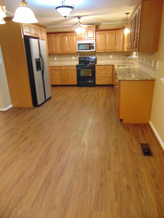 668 Mount Zion Rd NW, Georgetown, TN 37336 - kitchen featuring stainless steel fridge with ice dispenser, electric range, tasteful backsplash, light wood-style flooring, and glass insert cabinets