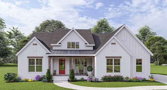 modern farmhouse featuring a front lawn and a porch