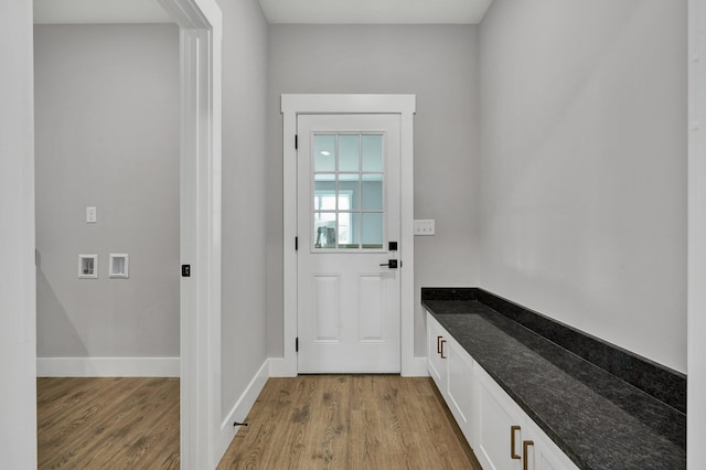 carpeted spare room featuring visible vents, ceiling fan, and baseboards