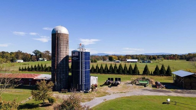 view of home's community featuring a mountain view and a rural view