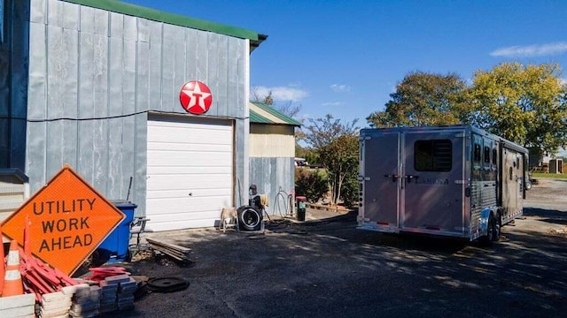 view of outdoor structure with a garage