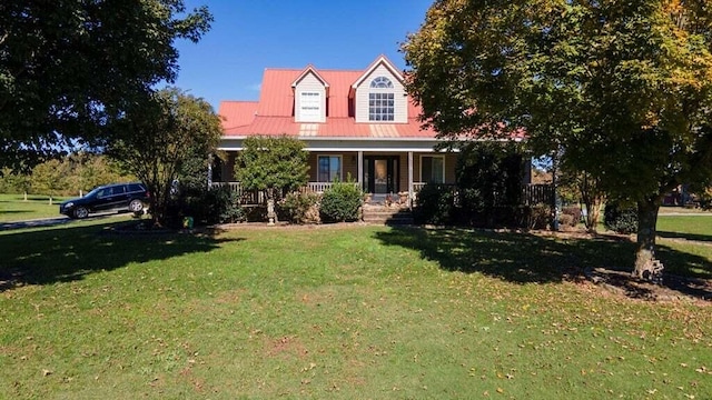 cape cod house with a porch and a front lawn