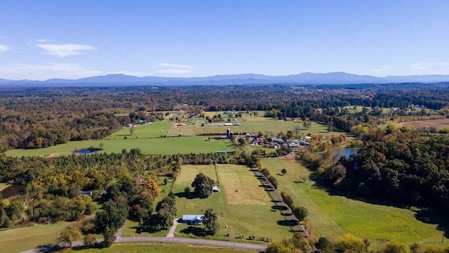 aerial view featuring a mountain view and a rural view