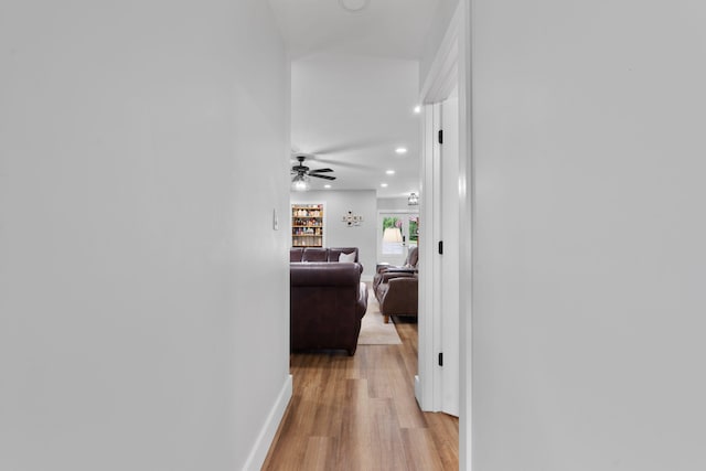 hallway with light wood-type flooring