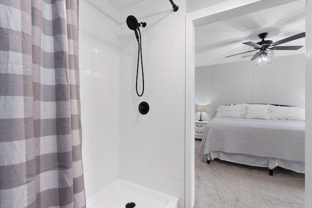 bathroom with ceiling fan and walk in shower