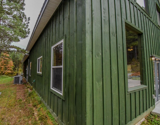 view of home's exterior with central AC unit