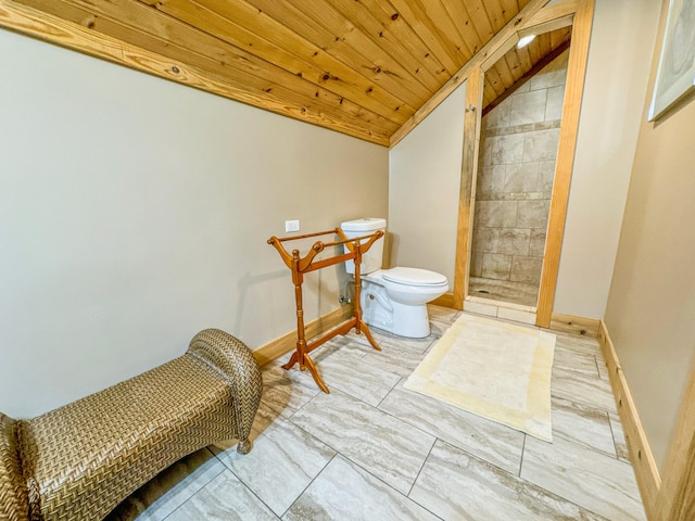 bathroom with wood ceiling, lofted ceiling, and toilet