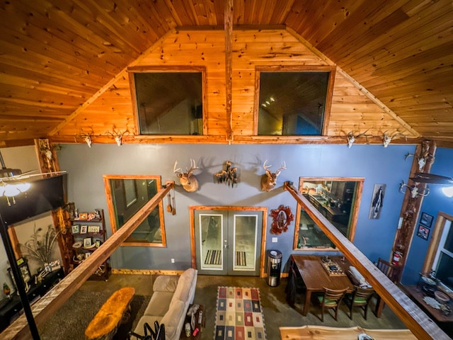 game room featuring french doors, wooden ceiling, and lofted ceiling