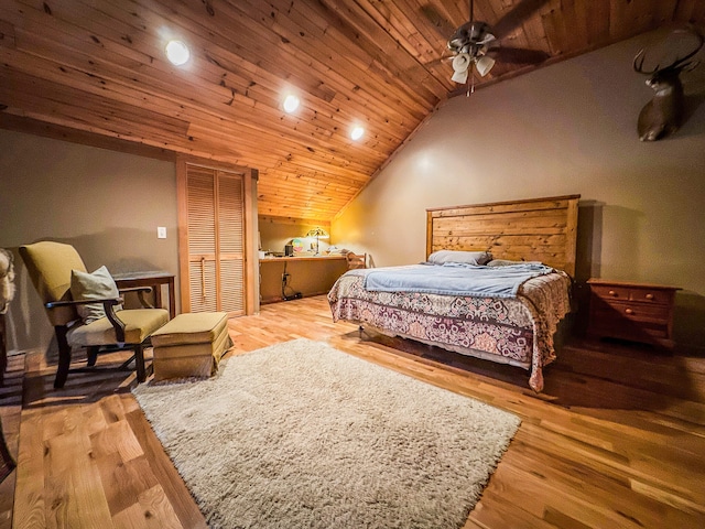 bedroom with wood-type flooring, wooden ceiling, ceiling fan, and lofted ceiling