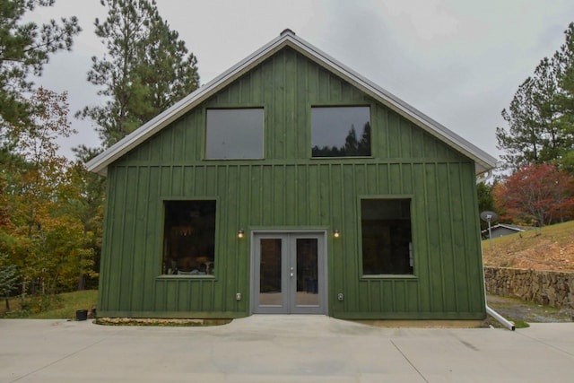 view of front of house with a patio and french doors