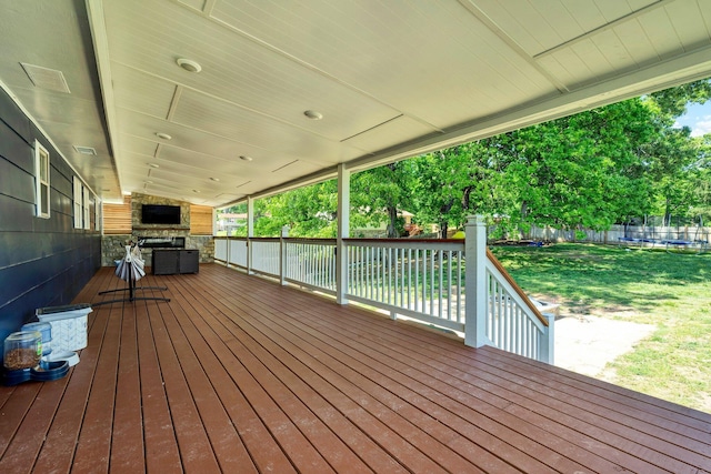 deck with visible vents, a yard, and a fenced backyard