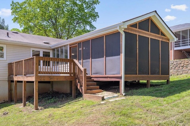205 W Daytona Dr, Chattanooga, TN 37415 - back of house featuring a sunroom, a lawn, a wooden deck, and a shingled roof