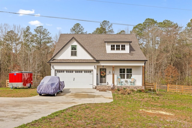 3914 Dogwood Valley Rd, Tunnel Hill, GA 30755 - modern inspired farmhouse featuring fence, a garage, concrete driveway, roof with shingles, and covered porch