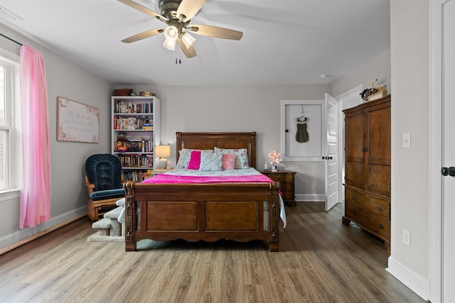 3914 Dogwood Valley Rd, Tunnel Hill, GA 30755 - bedroom featuring baseboards, ceiling fan, and wood finished floors