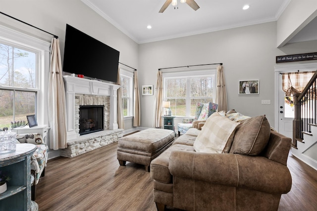 3914 Dogwood Valley Rd, Tunnel Hill, GA 30755 - living room with a stone fireplace, dark wood-style floors, crown molding, and ceiling fan