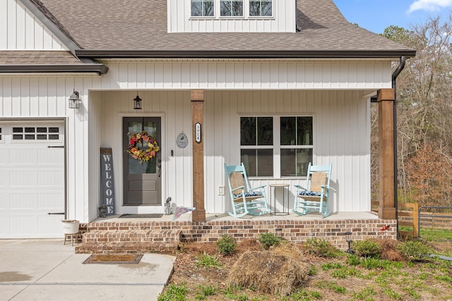 3914 Dogwood Valley Rd, Tunnel Hill, GA 30755 - entrance to property with a shingled roof, covered porch, a garage, and board and batten siding