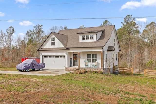 3914 Dogwood Valley Rd, Tunnel Hill, GA 30755 - modern farmhouse style home with driveway, covered porch, roof with shingles, cooling unit, and fence