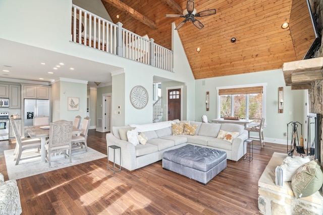 living room with wood ceiling, beamed ceiling, ceiling fan, hardwood / wood-style flooring, and high vaulted ceiling