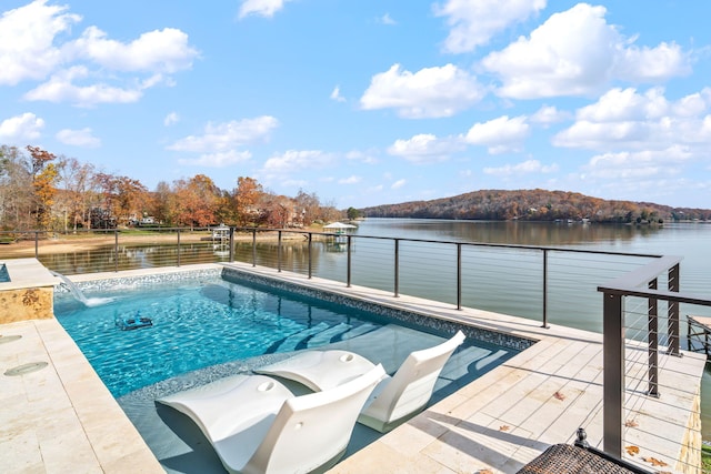 view of pool with pool water feature and a water view