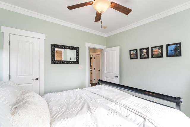 bedroom featuring ceiling fan and crown molding