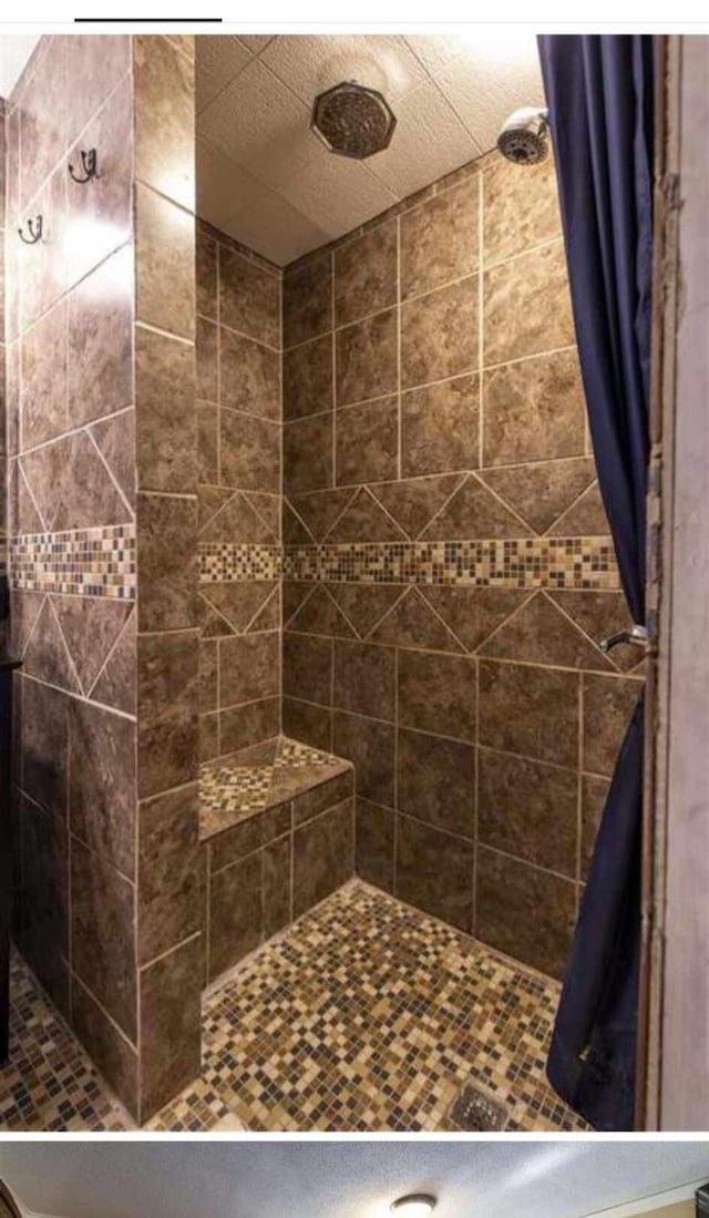 bathroom with a shower with curtain