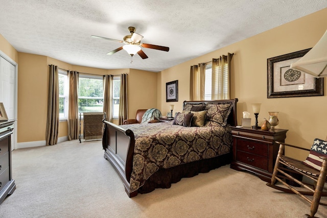 135 Charles Cir SE, Cleveland, TN 37323 - bedroom with light carpet, ceiling fan, and a textured ceiling