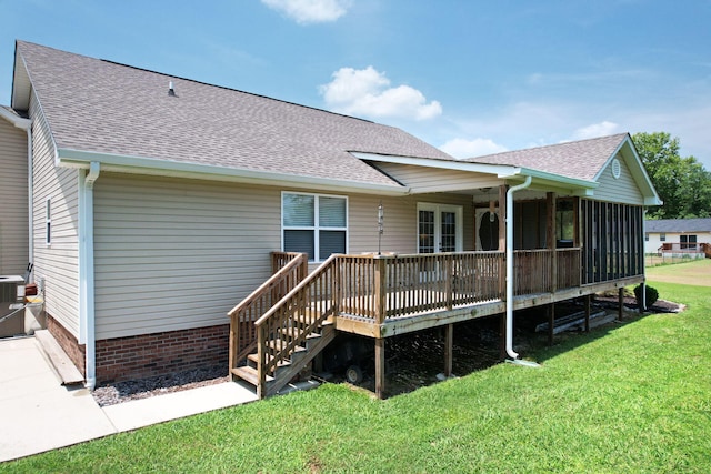 135 Charles Cir SE, Cleveland, TN 37323 - back of property with a shingled roof, a yard, a wooden deck, and stairway