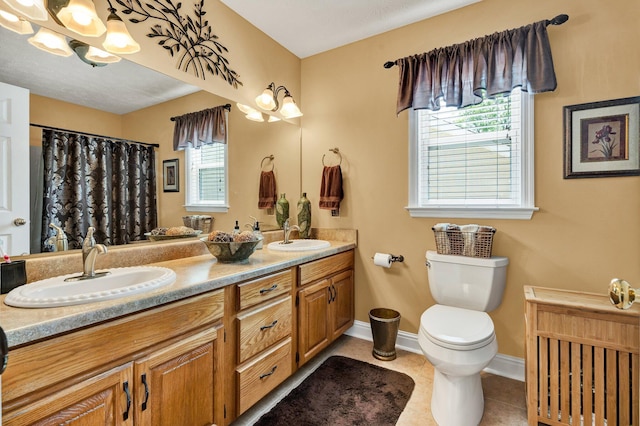 135 Charles Cir SE, Cleveland, TN 37323 - bathroom featuring double vanity, a chandelier, tile patterned floors, and curtained shower