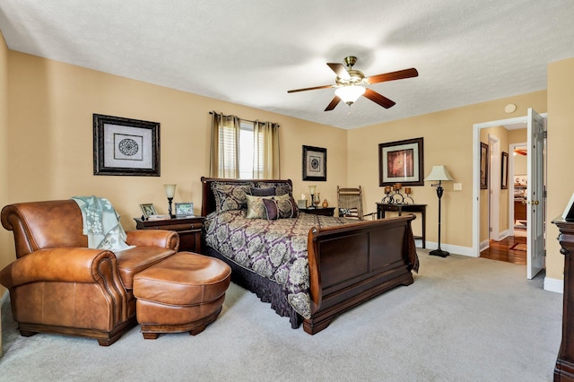 135 Charles Cir SE, Cleveland, TN 37323 - carpeted bedroom with baseboards and a ceiling fan