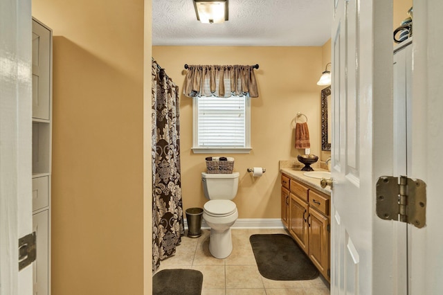 135 Charles Cir SE, Cleveland, TN 37323 - full bath featuring vanity, tile patterned floors, and a textured ceiling