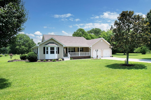 135 Charles Cir SE, Cleveland, TN 37323 - single story home featuring covered porch, driveway, an attached garage, and a front yard
