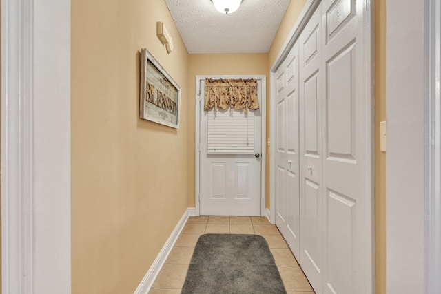 135 Charles Cir SE, Cleveland, TN 37323 - entryway with a textured ceiling and light tile patterned floors