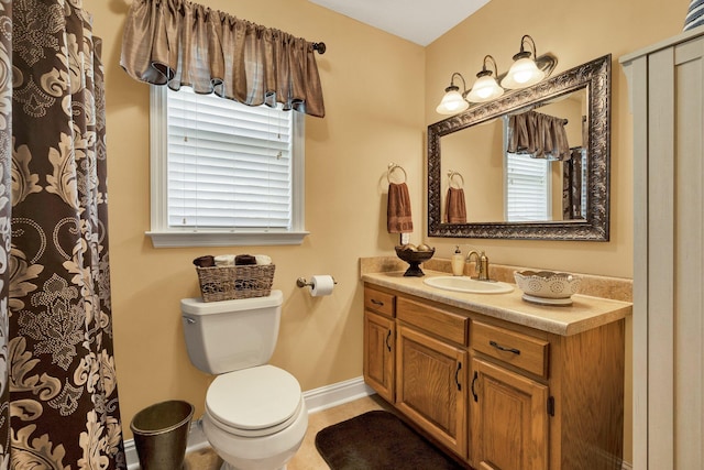 135 Charles Cir SE, Cleveland, TN 37323 - bathroom featuring vanity, healthy amount of natural light, and a shower with curtain