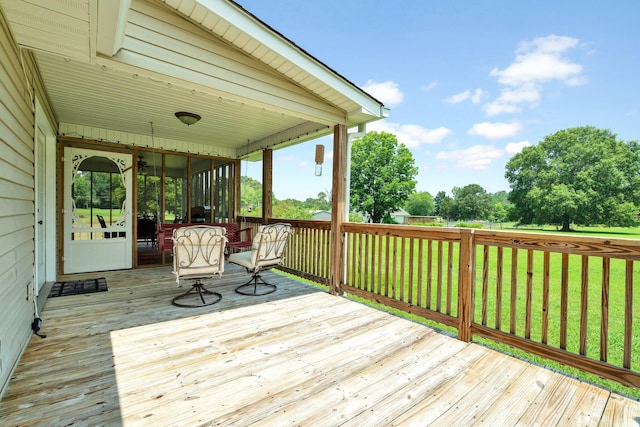 135 Charles Cir SE, Cleveland, TN 37323 - wooden deck featuring a lawn and a sunroom