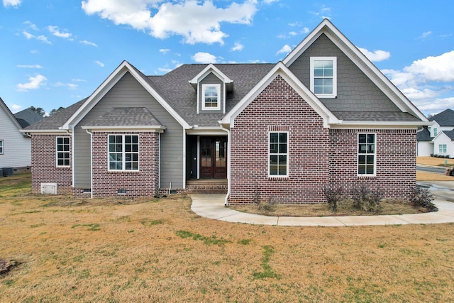 view of front facade featuring a front yard