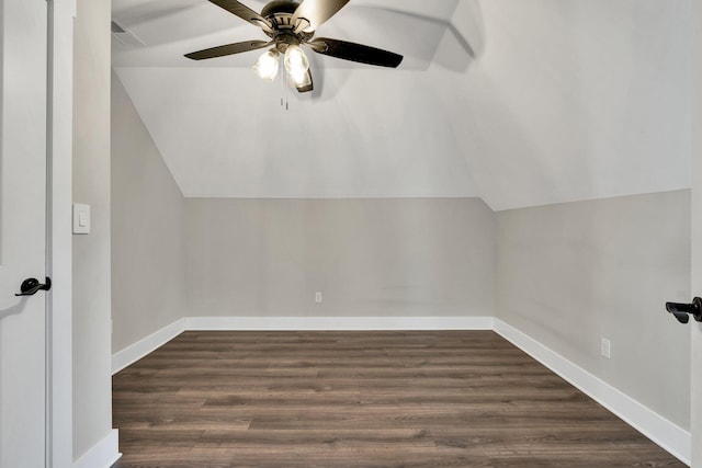 additional living space featuring ceiling fan, dark hardwood / wood-style flooring, and lofted ceiling