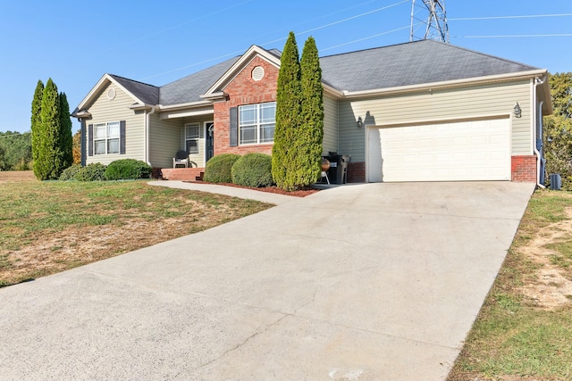 ranch-style house featuring a garage, brick siding, concrete driveway, and a shingled roof