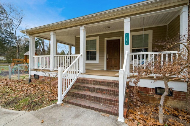 entrance to property with covered porch