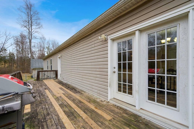 wooden terrace with grilling area