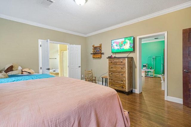 bedroom with crown molding, a textured ceiling, and dark hardwood / wood-style flooring