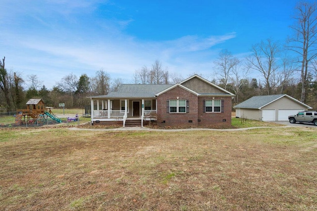 view of front of house with a playground, covered porch, a garage, an outdoor structure, and a front yard