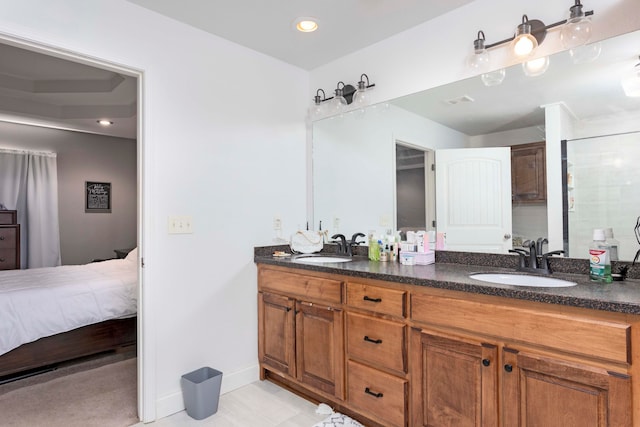 bathroom with vanity and tile patterned floors