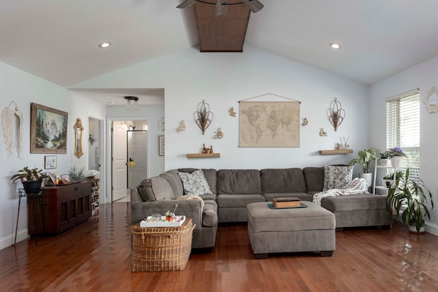 living room with dark hardwood / wood-style floors and lofted ceiling