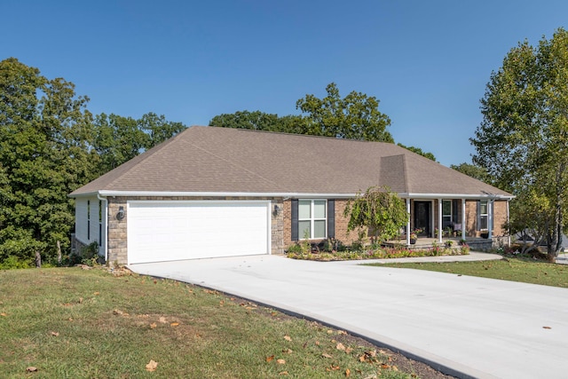 ranch-style house with a front lawn and a garage