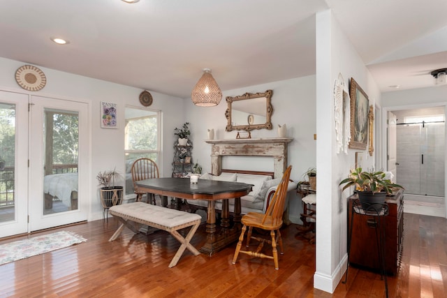 dining area with dark hardwood / wood-style floors