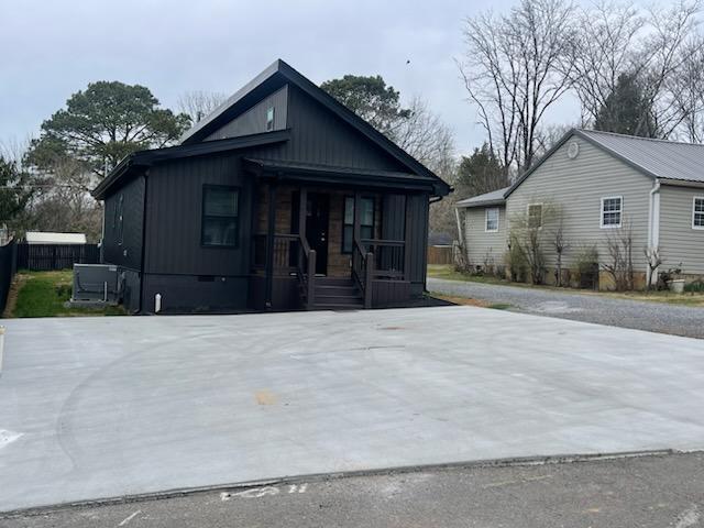 view of front of home with board and batten siding and covered porch