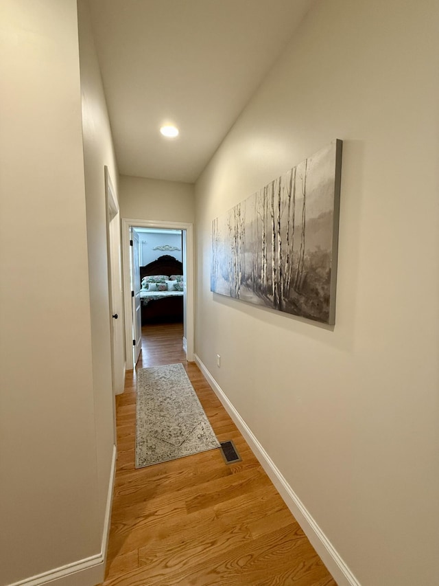 hallway with light wood-type flooring