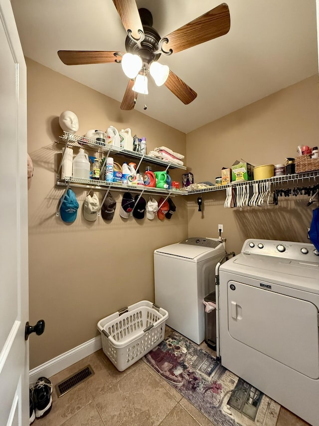 laundry room with washing machine and dryer and ceiling fan